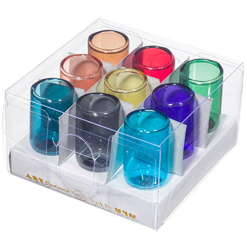 Nine colored glass cups for oil